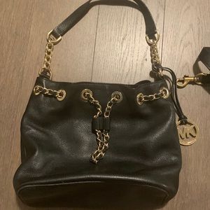 Michael Kohrs black purse